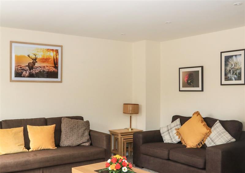Relax in the living area at Sawtons Cottage 2, Dawlish Warren