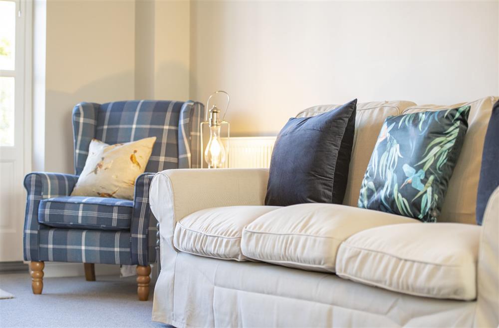 Enjoy the comfortable seating in the sitting room at Saxon House, Harome, Nr Helmsley