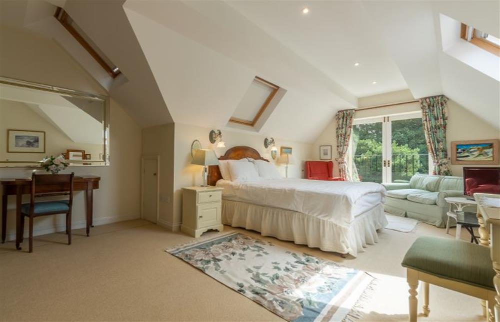 First floor: The duel aspect master suite  at Saxon Shore Cottage, Burnham Deepdale near Kings Lynn
