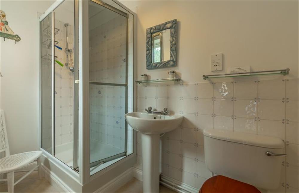 Ground floor: En suite shower room in bedroom two at Saxon Shore Cottage, Burnham Deepdale near Kings Lynn