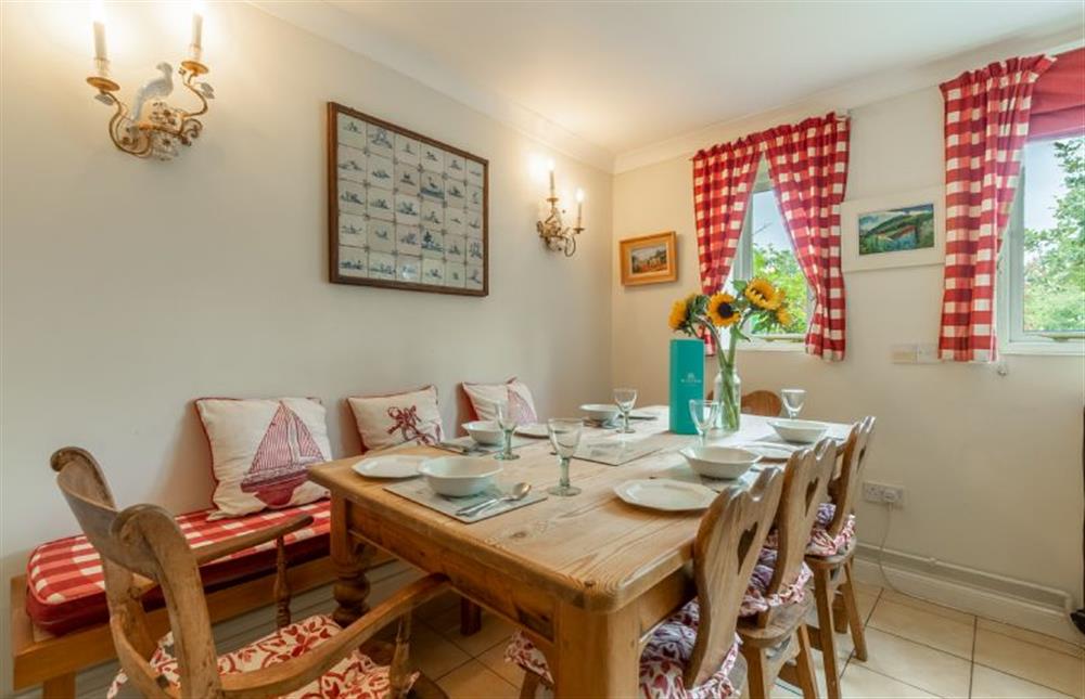 Ground floor: The pretty dining table and chairs at Saxon Shore Cottage, Burnham Deepdale near Kings Lynn