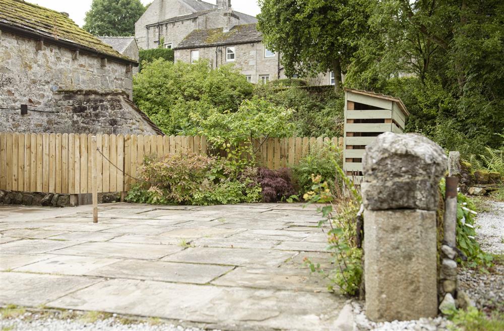 Private paved parking area opposite the property at Scala Glen Cottage, Skipton