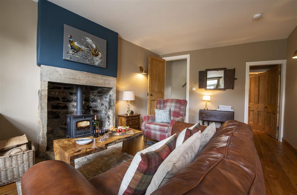 The sitting room is perfect for relaxing after a day of exploring at Scala Glen Cottage, Skipton