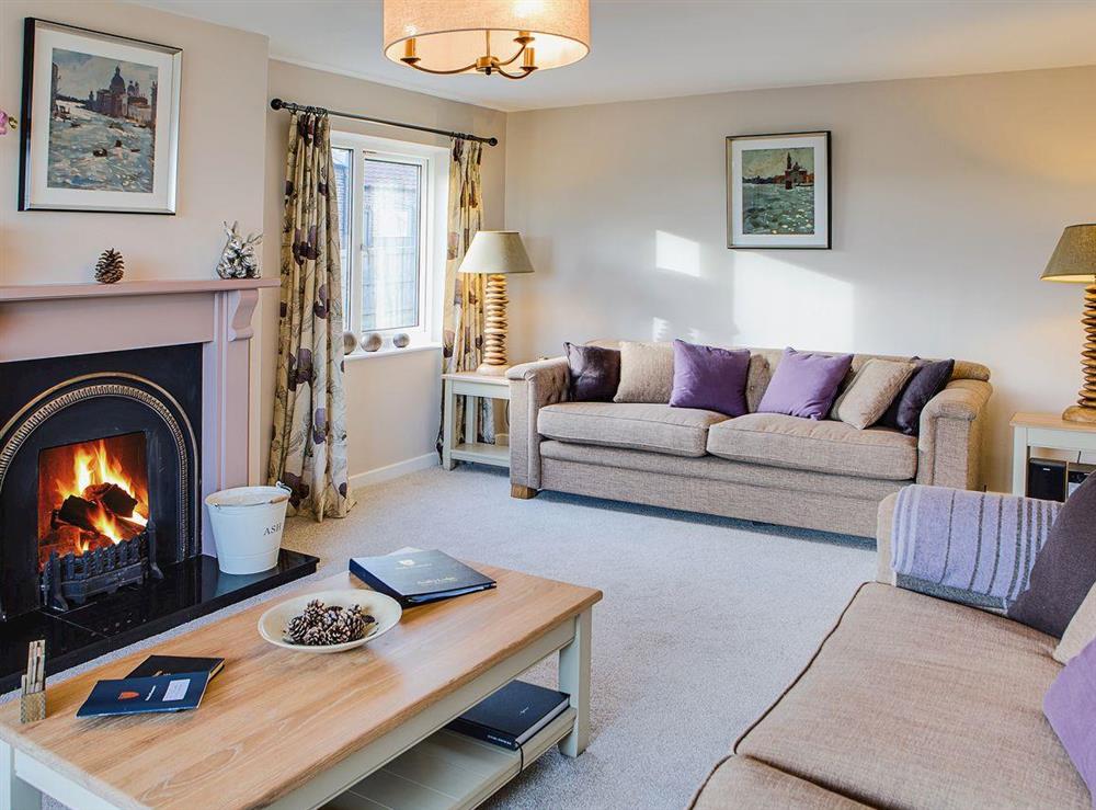 The spacious and welcoming living room benefits from dual aspect windows to make the most of the stunning views at Scalby Lodge Farmhouse in Scalby, Scarborough, N. Yorks., North Yorkshire