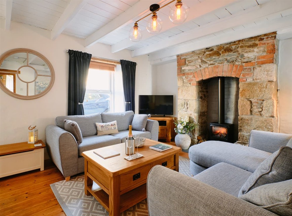 Living room at Scallop Cottage in Porthleven, Cornwall