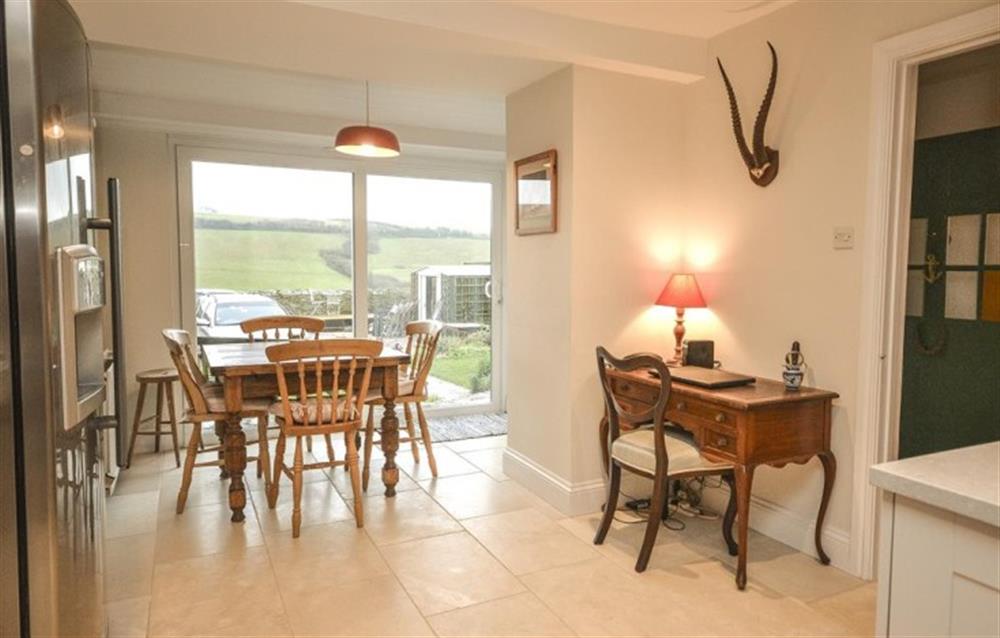 Another view of the kitchen and dining table (Can be extended to seat 6) at School Cottage in Hope Cove