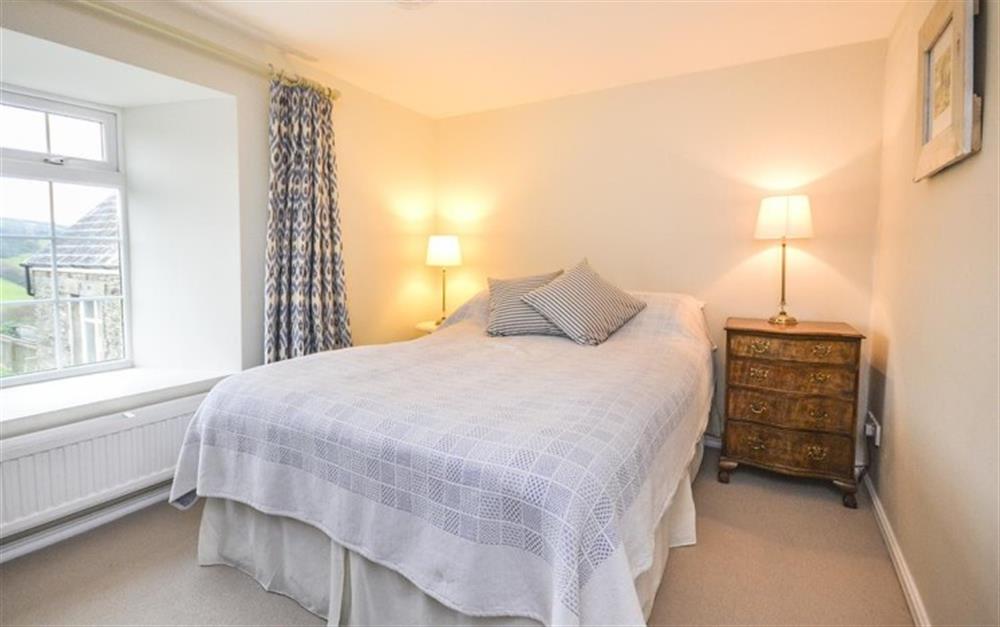 Bedroom 2 with double bed at School Cottage in Hope Cove