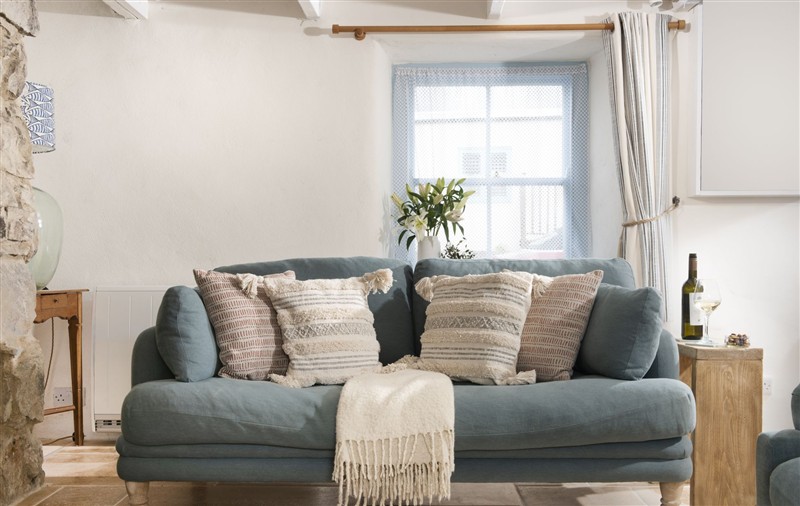 Relax in the living area at School Cottage, Cornwall