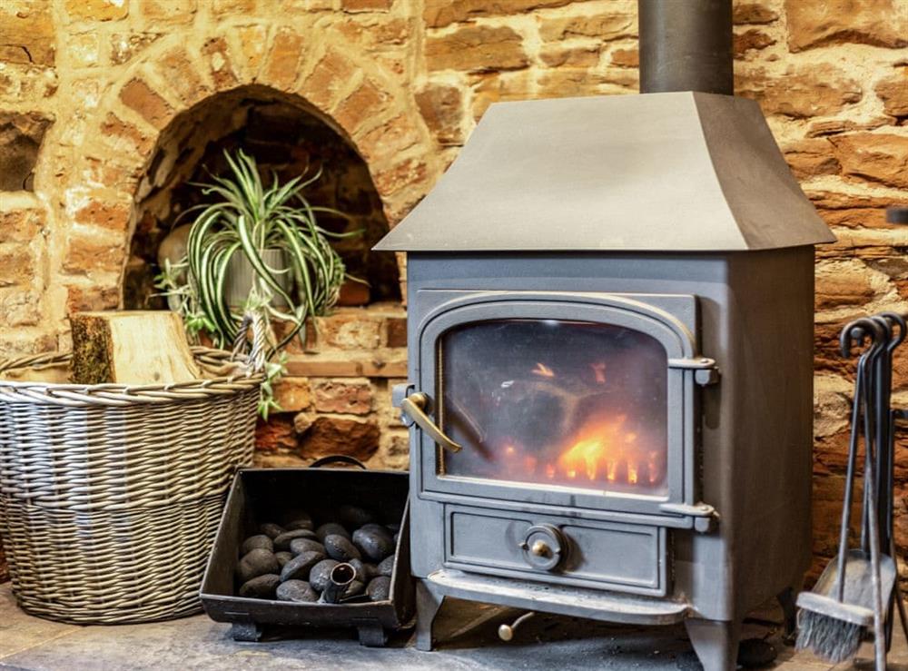 Cosy log burner at The Scotch Arms Mews, 