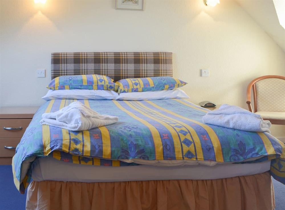 Inviting and relaxing bedroom with double bed at White Gables, 