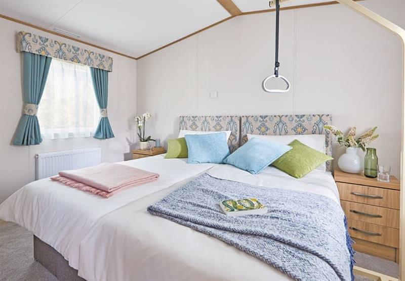 A double bedroom at Scoutscroft Leisure Park in Coldingham, Nr Eyemouth