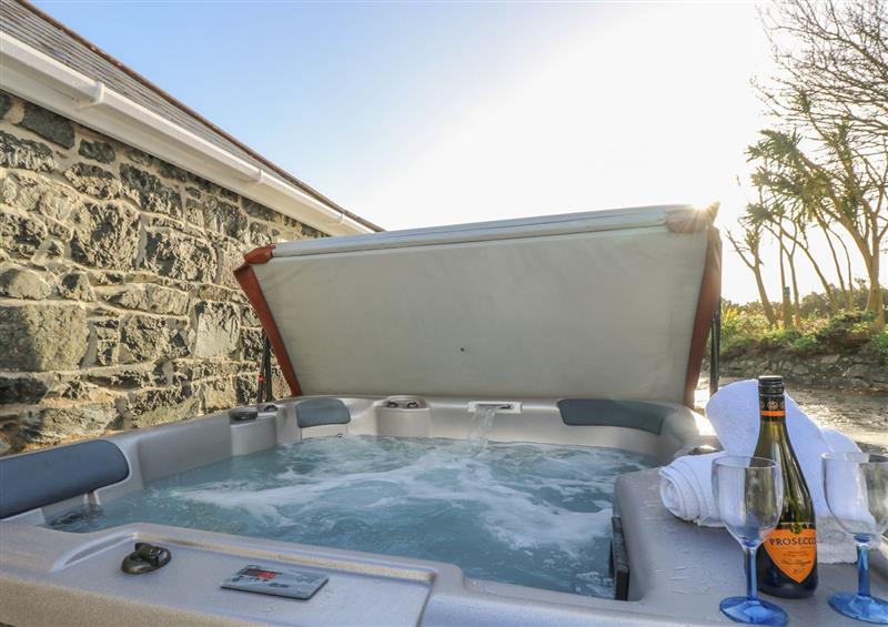 Spend some time in the hot tub at Scrumpy, Mullion