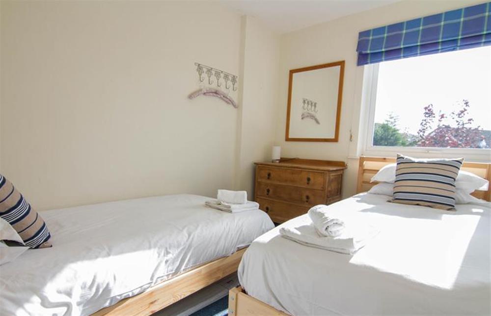 First floor: Bedroom one has twin beds at Sea Aster, Brancaster Staithe near Kings Lynn