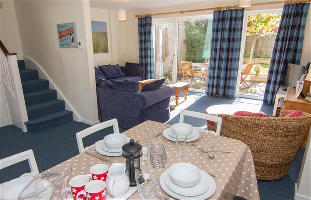 Ground floor: Dining area with seating for six at Sea Aster, Brancaster Staithe near Kings Lynn