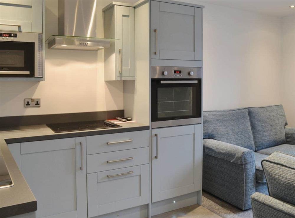 Open plan living/dining room/kitchen at Sea Blue Cottage in Scarborough, North Yorkshire
