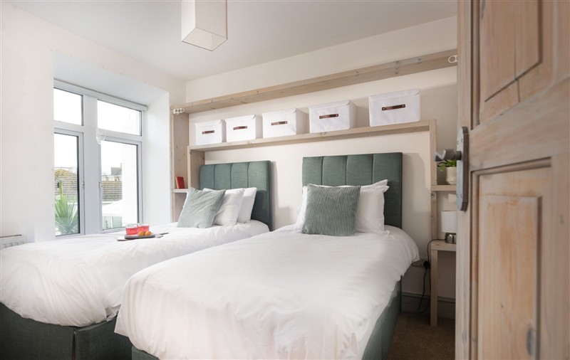 A bedroom in Sea Boots (sleeps 8) (photo 2) at Sea Boots (sleeps 8), Cornwall