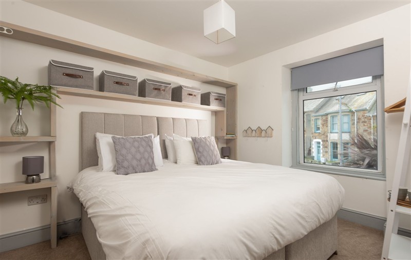 One of the bedrooms at Sea Boots (sleeps 8), Cornwall