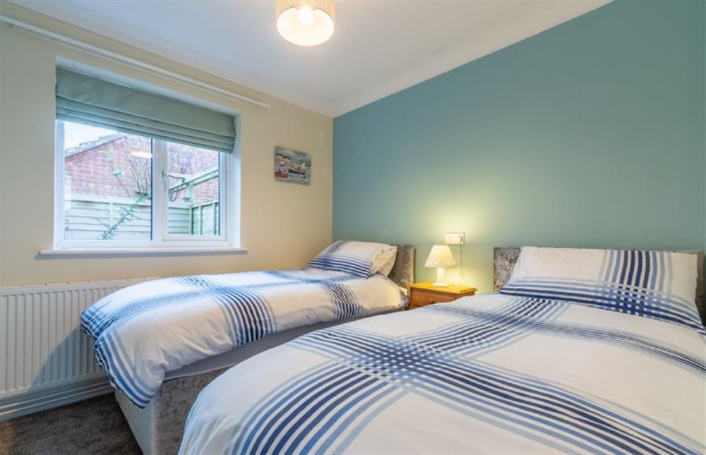 Ground floor: Bedroom two with 3ft twin single beds at Sea Breeze, Brancaster near Kings Lynn