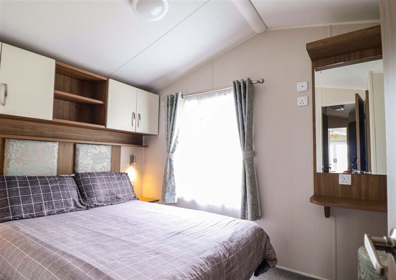 This is a bedroom at Sea Breeze C38 Dyffryn Seaside Estate, Dyffryn Ardudwy