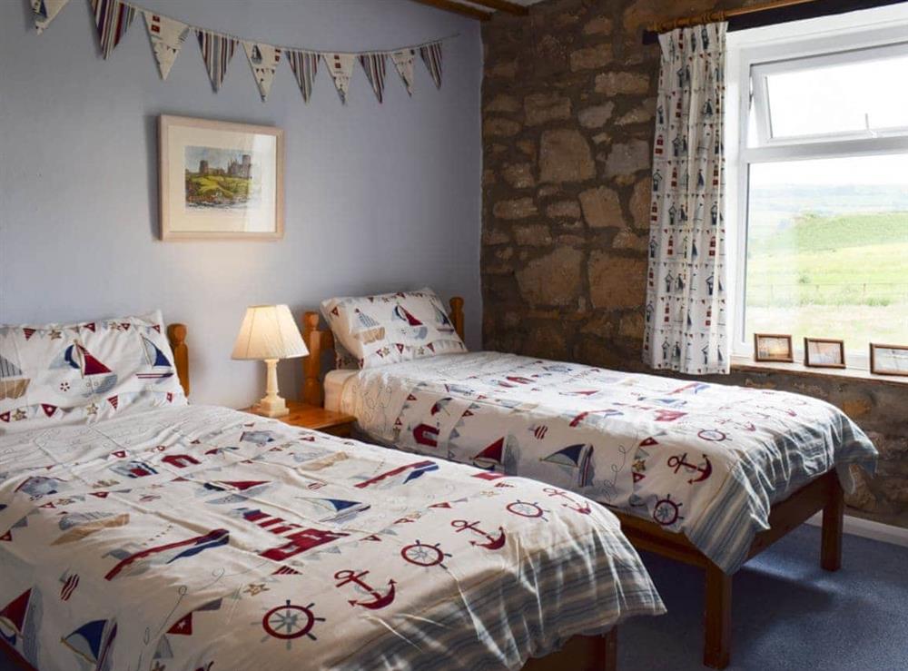 Twin bedroom at Sea Breeze Cottage in Cowbar, near Staithes, North Yorkshire
