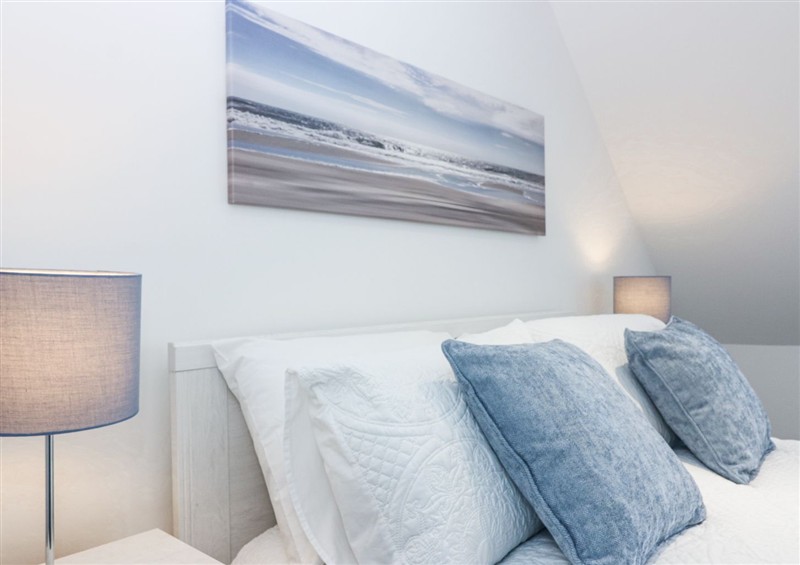 One of the bedrooms at Sea Breeze St Combs, St Combs