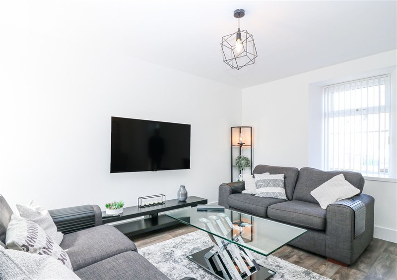 Relax in the living area at Sea Breeze St Combs, St Combs
