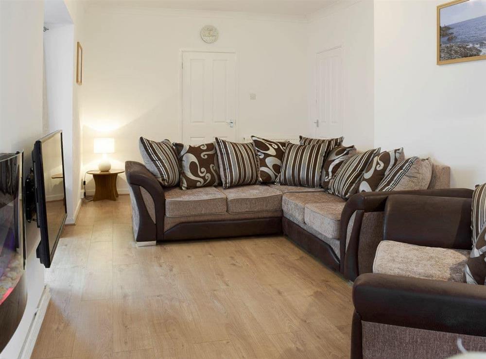 Comfy seating in spacious living area at Sea Breeze in The Mumbles, Glamorgan, West Glamorgan