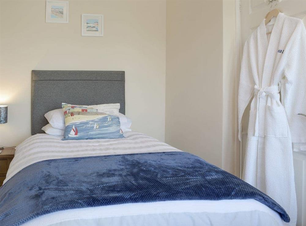 Comfortable twin bedroom at Sea Dreams in Saundersfoot, Dyfed