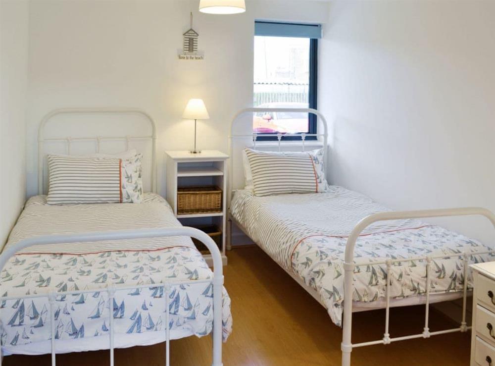 Twin bedroom at Sea Drift in West Bay, near Bridport, Dorset