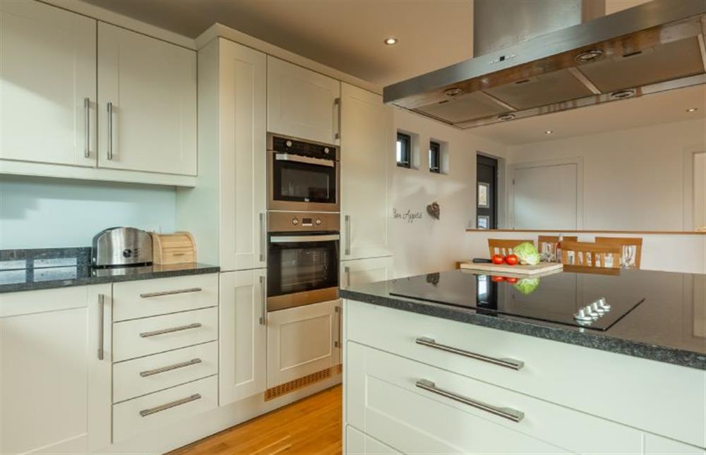Sea Gem, St Agnes. Full equipped kitchen and island unit with breakfast bar at Sea Gem, Chapel Porth, St Agnes