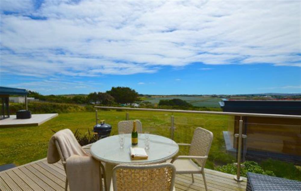Sea Gem, St Agnes. Large decked area with garden furniture and barbecue (photo 2) at Sea Gem, Chapel Porth, St Agnes