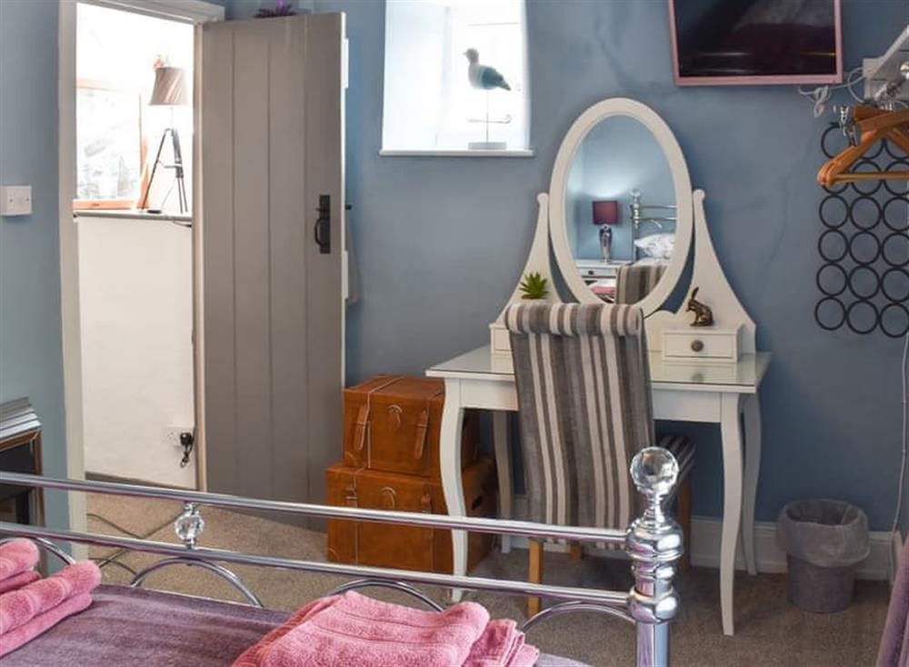 Bedroom with beautiful fixtures and fittings at Sea Glass Cottage in Holcombe, Dawlish, Devon