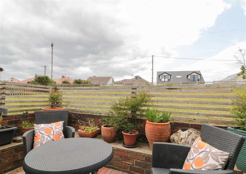 Enjoy a cup of tea on the patio at Sea Haven, Hunmanby Gap near Primrose Valley