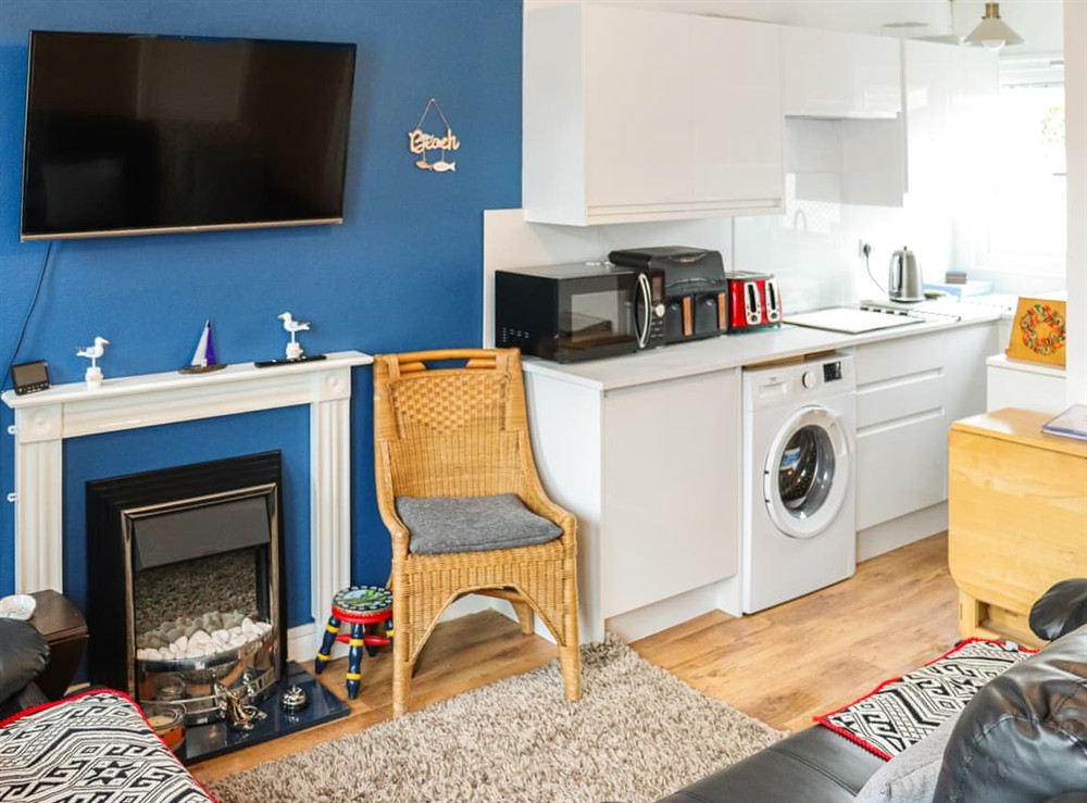 Open plan living space at Sea Haven in Swansea, West Glamorgan