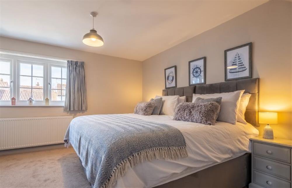Master bedroom with super-king bed at Sea Haven, Wells-next-the-Sea