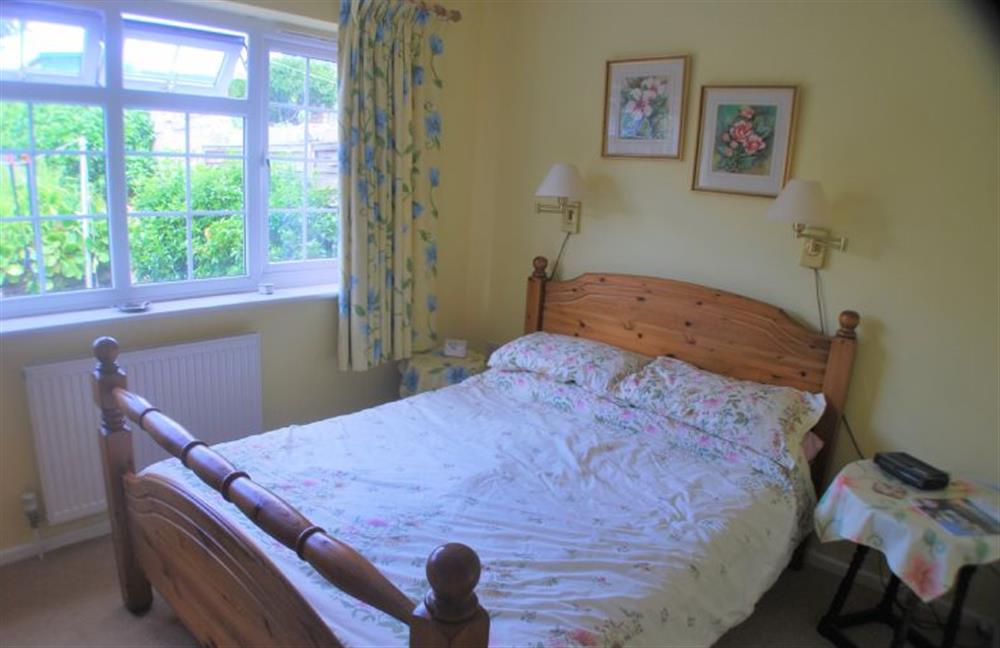 Ground floor: Double bedroom has en-suite shower room at Sea Holly, Brancaster Staithe near Kings Lynn