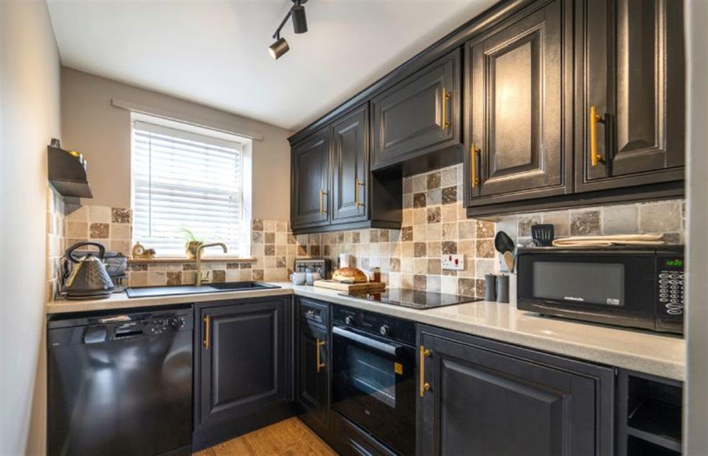 A well presented galley kitchen at Sea Holly Cottage, Snettisham near Kings Lynn