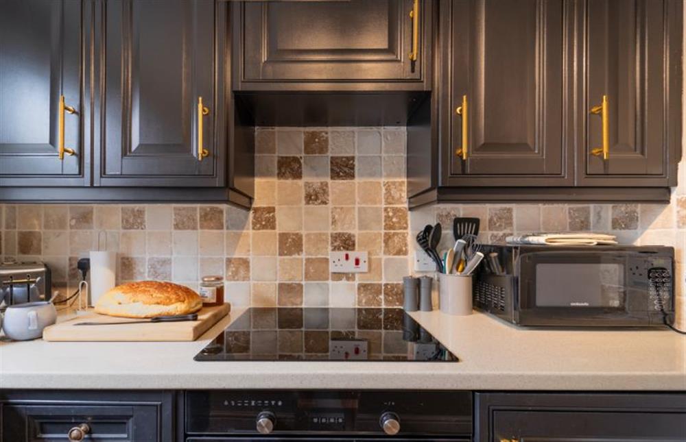 The kitchen has an electric cooker and hob (photo 2) at Sea Holly Cottage, Snettisham near Kings Lynn