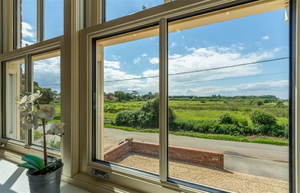 First floor: The Master bedroom has lovely views over the marshes (photo 2) at Sea Holly Cottage, Thornham near Hunstanton