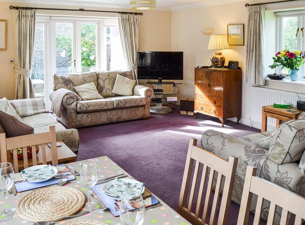 Living room/dining room at Sea Holly Cottage in West Runton, Norfolk