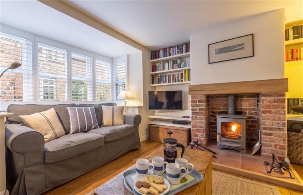 Ground floor: Sitting room with wood burning stove at Sea Holly House, Blakeney near Holt