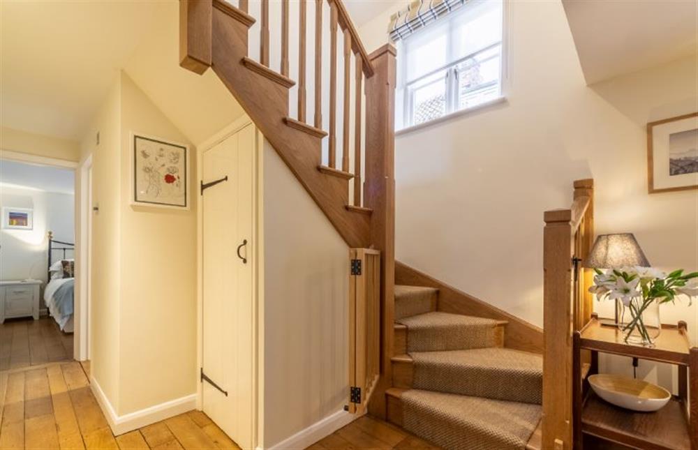 Ground floor: Stairs to first floor at Sea Holly House, Blakeney near Holt