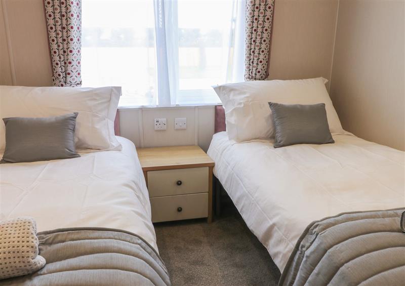 A bedroom in Sea Holly Lodge at Sea Holly Lodge, Runswick Bay