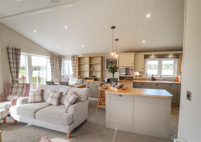 Relax in the living area at Sea Holly Lodge, Runswick Bay