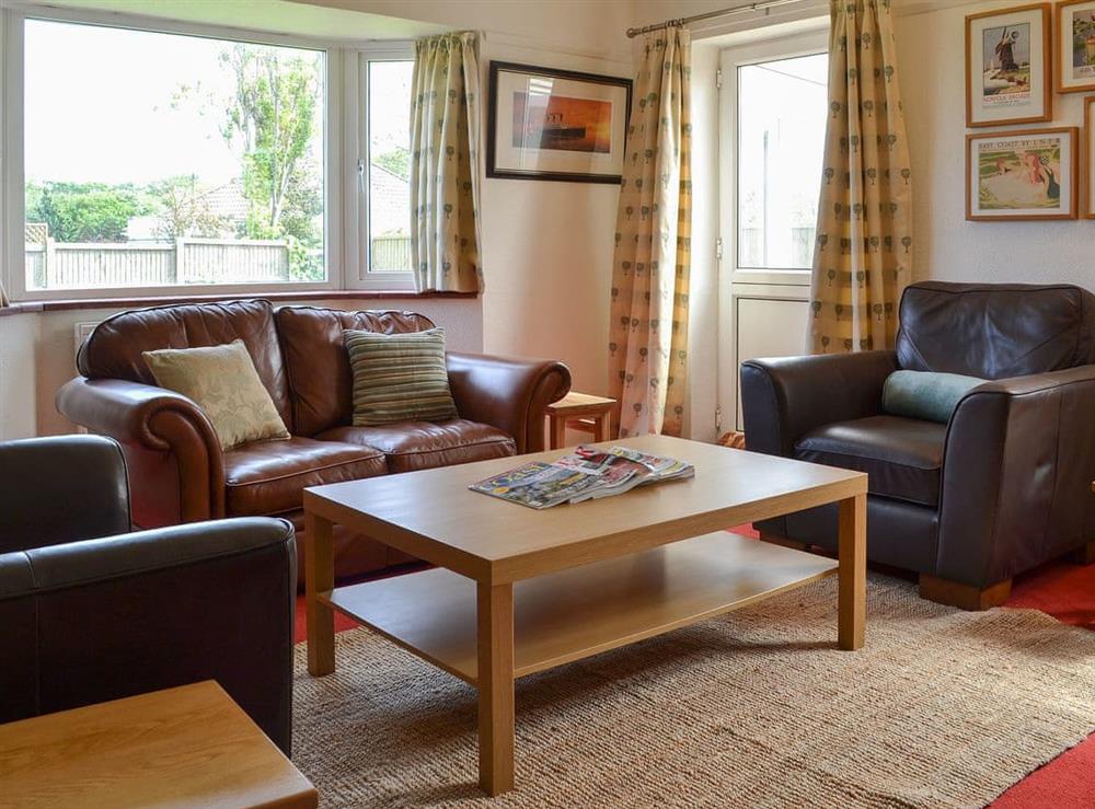 Welcoming living room at Sea La Vie in Mundesley, near North Walsham, Norfolk