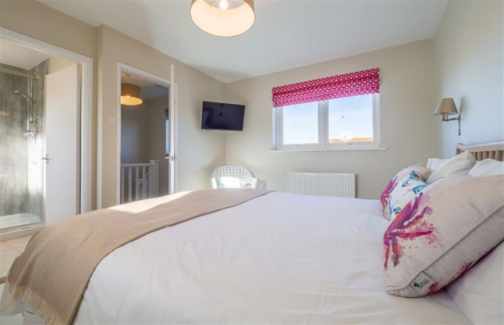 The master bedroom has en-suite shower room at Sea Lodge, Brancaster near Kings Lynn