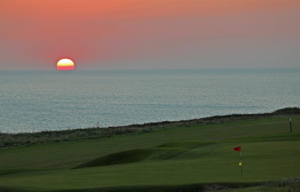 Sunset over the golf course at Sea Peep in Whimbrels Edge, Thurlestone