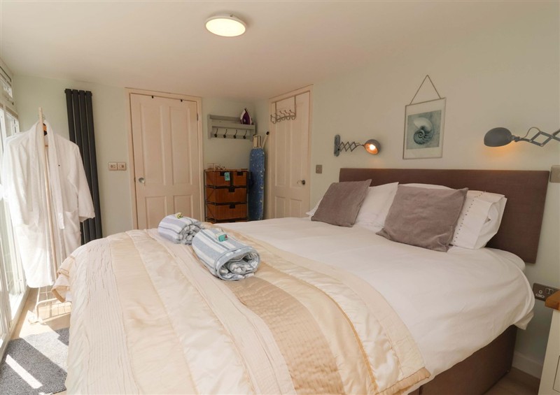 A bedroom in Sea Sanctuary at Sea Sanctuary, Northam