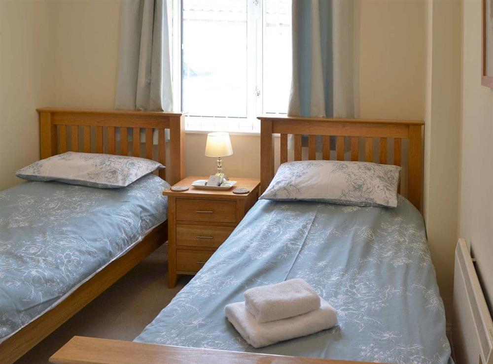 Comfortable twin bedroom at Sea Spray in Bacton, Norfolk