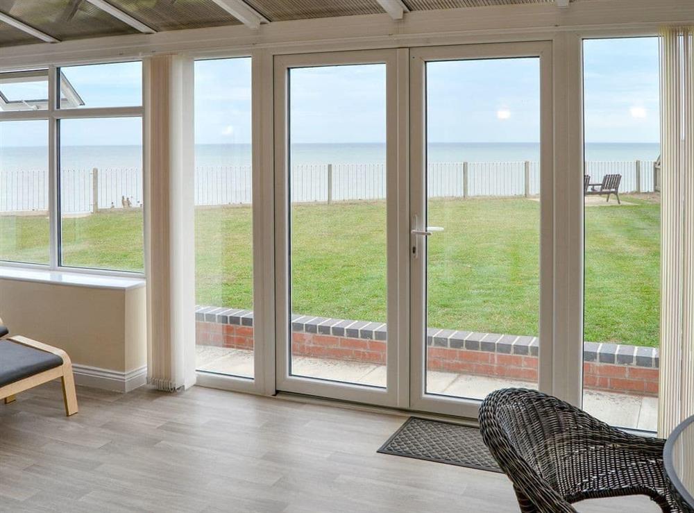 Light and airy conservatory at Sea Spray in Bacton, Norfolk